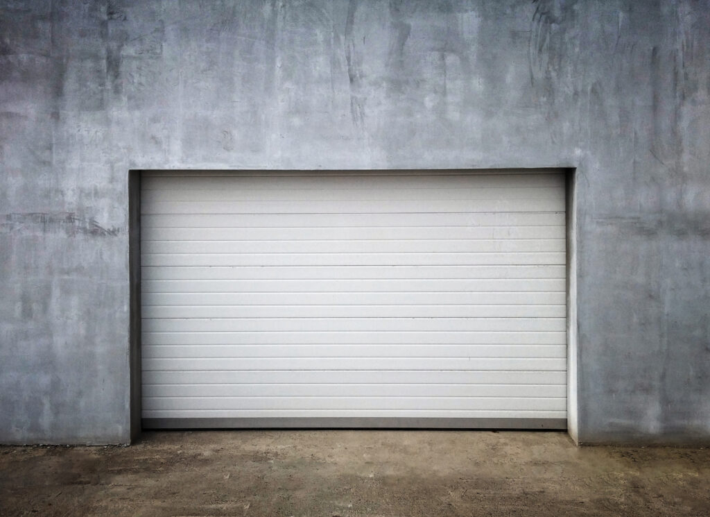 What are the Different Types of Commercial Garage Doors? - Lenworth Dock & Door Standard Overhead Commercial Garage Door